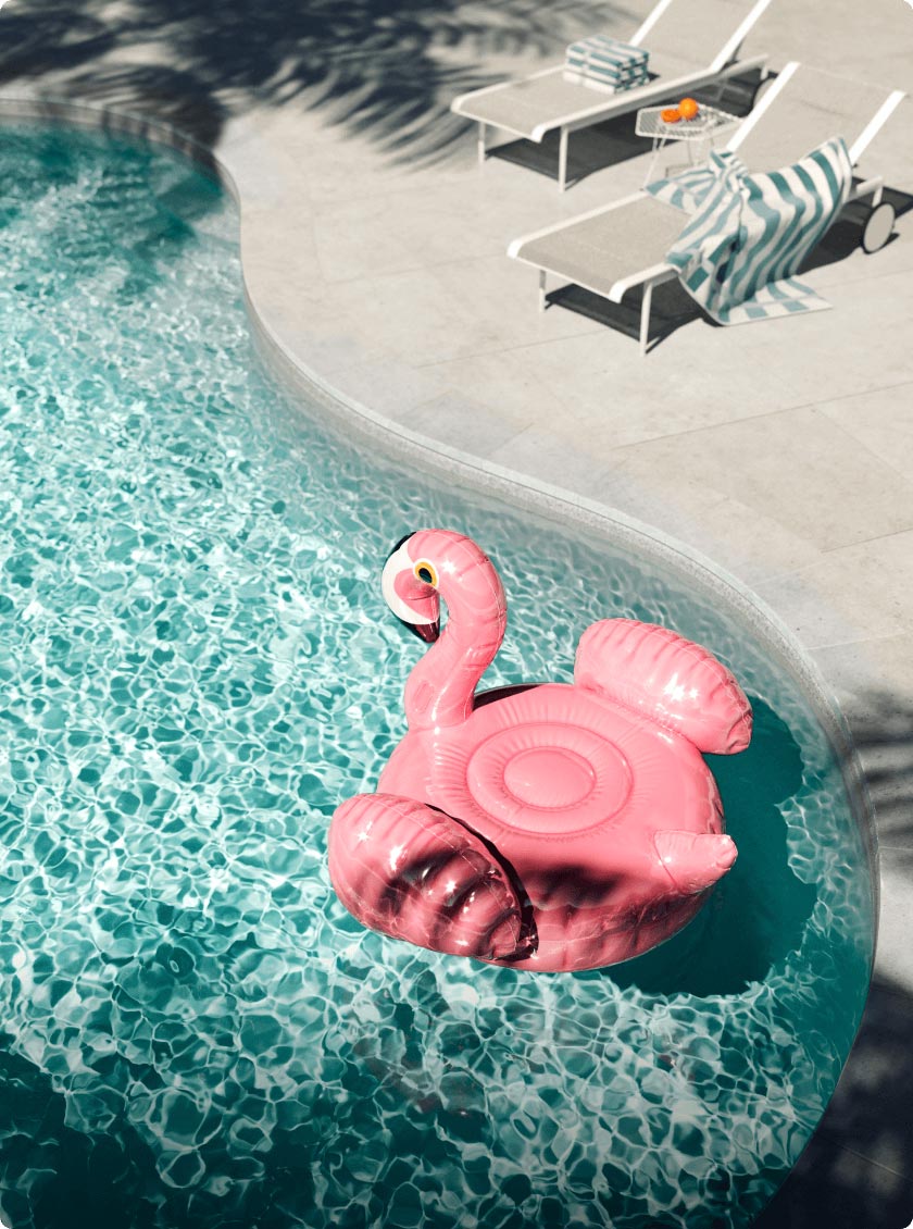 inground fiberglass pool with pink flamingo floaty