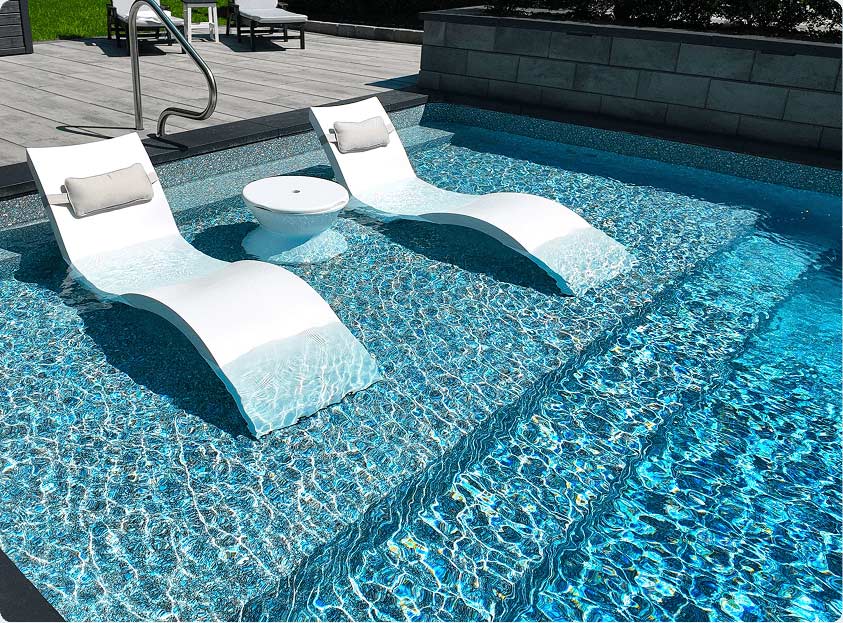 spacious tanning ledge built into inground pool
