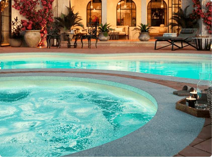 tranquil night with inground spa with candles