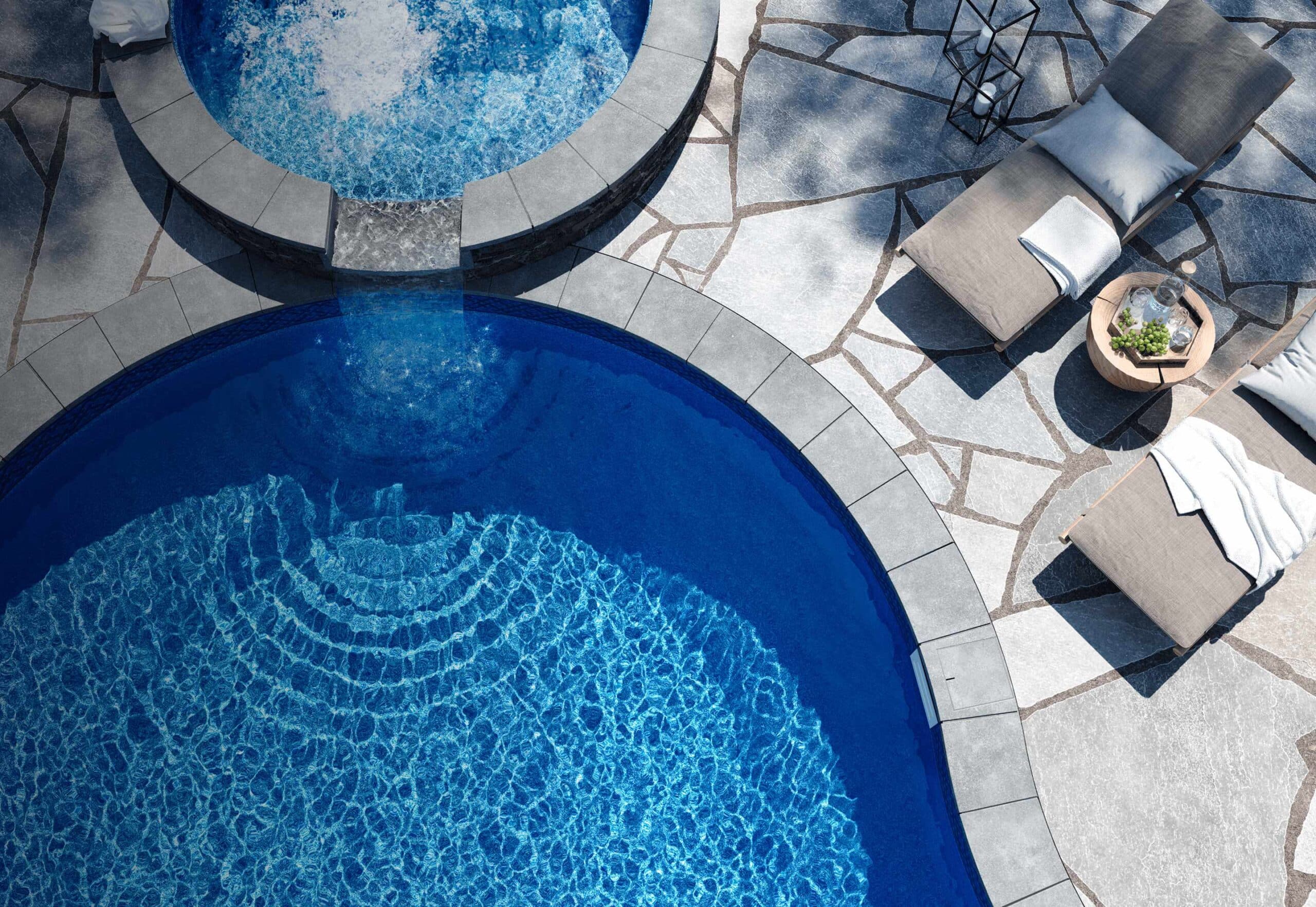 Overview of spa overflowing into inground pool